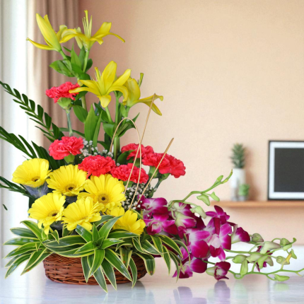 Mixed exotic flower basket arrangement with orchids, lilies, gerberas & carnations