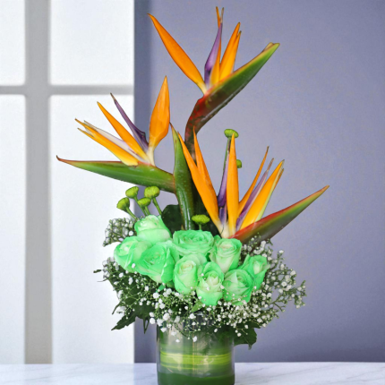 Bird of paradise and green roses vase arrangement with fillers
