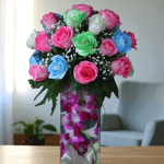 Multicolor roses in tall orchid vase with pink, green, blue and white roses
