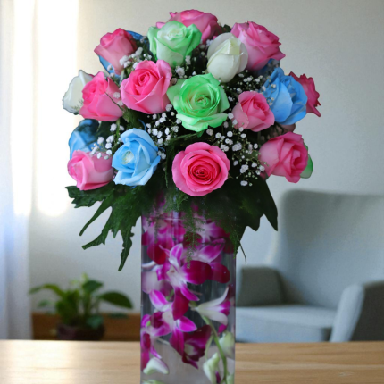 Multicolor roses in tall orchid vase with pink, green, blue and white roses