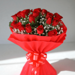 Red roses bouquet with white gypsy flowers