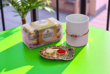 a beautifully crafted Rudraksh Rakhi with Ferrero Rocher Chocolate