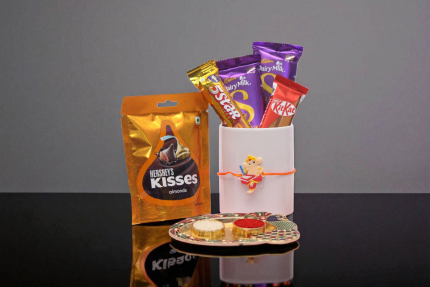 Chhota Ganesh Rakhi, Dairy Milk Silk, 5 Star, KitKat, and a luxurious Hershey’s Kisses Almonds pack - YHOJA.COM