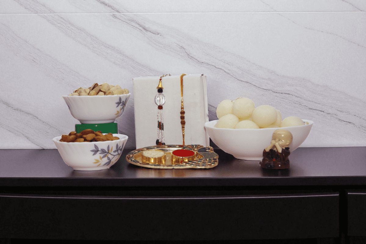 a stunning Bhaiya Rakhi and Lumba Rakhi for Bhabhi With Dry Fruit Or Rasgulla