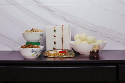 a stunning Bhaiya Rakhi and Lumba Rakhi for Bhabhi With Dry Fruit Or Rasgulla