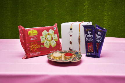 Rakhi Delight Combo with Soan Papdi & Dairy Milk Fruit & Nut Chocolates