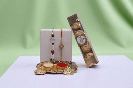 This beautifully curated Bhaiya Bhabhi Rakhi Combo with 4-piece pack of Ferrero Rocher chocolates,