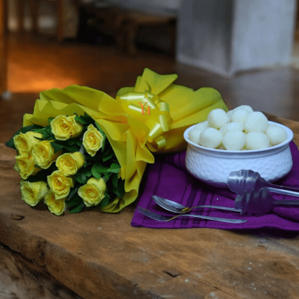 Golden Bloom & Sweet Delight Combo with yellow roses bouquet and bowl of Bengali rasgullas.