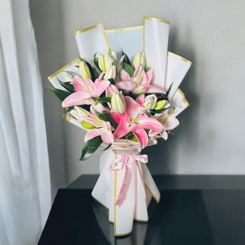 Photoroom-20250202_210300 Pink oriental lily bouquet wrapped in premium white paper with ribbon bow